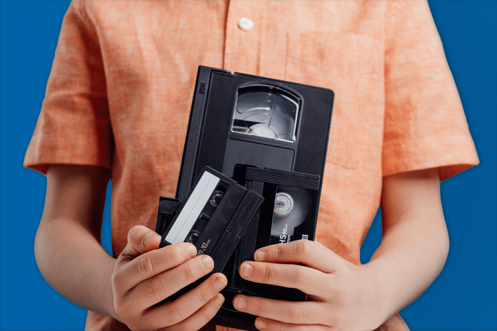 Boy holding tapes 1